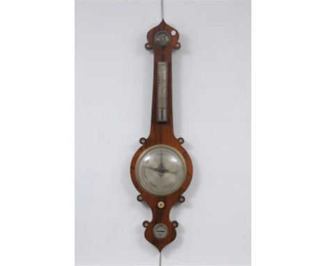 A George IV rosewood and mother of pearl inlaid wheel barometer, with a 20cm silver dial above a hygrometer, thermometer, lac