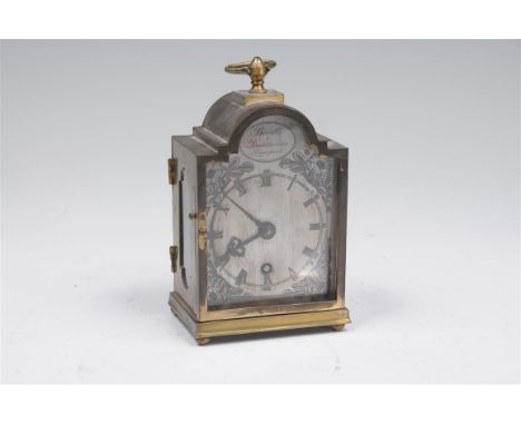 A 20th century mantel timepiece Boodle and Dunthorne Liverpool with a silvered dial Roman and Arabic numerals leaf and flower