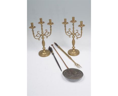 A pair of two branch candelabra each raised upon fluted baluster stems, circular bases, 43cms, a brass and mahogany telescopi