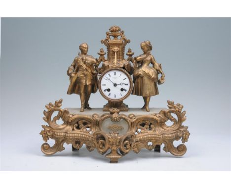 A 19th century French gilt spelter and alabaster figural mantel clock with a 8cm white enamel dial signed Hey Marc, Paris wit