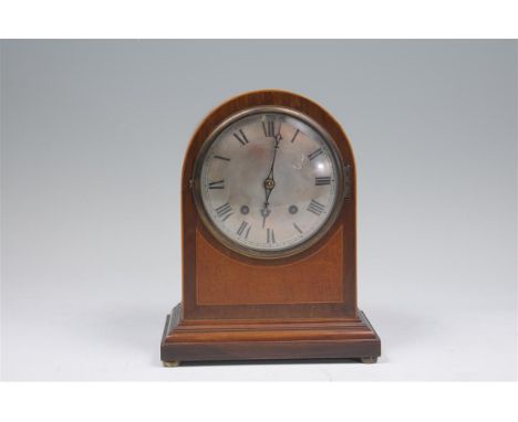 An Edwardian inlaid mahogany mantel clock with a 15cm silvered dial with Roman numerals, the two train spring driven key woun