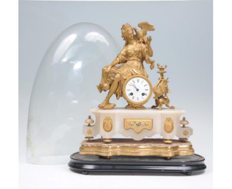 A 19th century gilt metal and alabaster mantel clock with an 8cm convex white dial with Roman numerals, the two train eight d