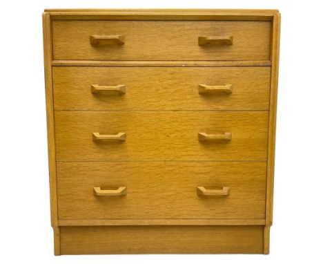 E. Gomme for G-Plan - 'Brandon' light oak chest, fitted with four long drawers, on skirted baseDimensions: Height:&nbsp;85cm&