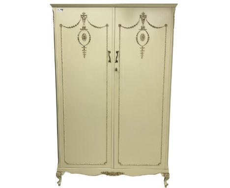 French classic design cream painted double wardrobe, the doors decorated with gilt and cream applied urn motifs with extendin