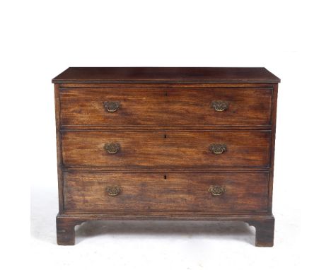 A 19TH CENTURY MAHOGANY CHEST OF THREE LONG DRAWERS with brass handles and bracket feet, 117cm wide x 55cm deep x 92cm high C