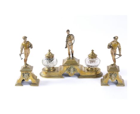 A LATE 19TH CENTURY BRASS AND COLD PAINTED THREE PIECE DESK INKWELL SET with a jockey, figures and horse head design, having 