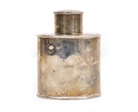 A SILVER TEA CADDY of oval form, with marks for London 1891, 150 grams Condition: several small dents, the top section slight