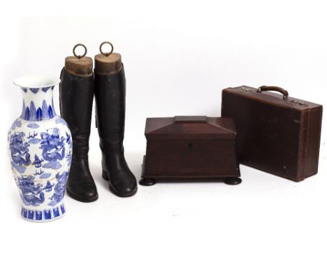 A LARGE VICTORIAN MAHOGANY TEA CADDY of sarcophagus form with fitted interior, with two lidded compartments and glass sugar b