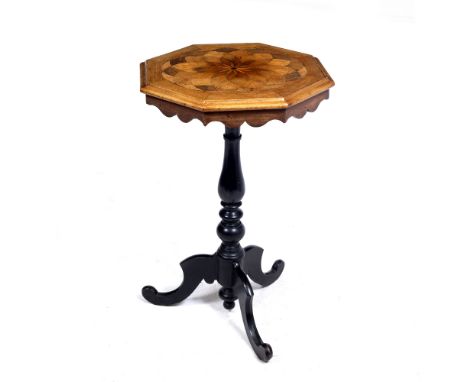 AN ANTIQUE OCTAGONAL SPECIMEN WOOD OCCASIONAL TABLE with ebonised turned column support and tripod base, 49cm wide x 76.5cm h