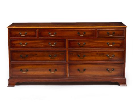A 20TH CENTURY YEW WOOD VENEERED SIDEBOARD with nine drawers, swan neck handles and on bracket feet, 52cm x 47cm x 78cm toget