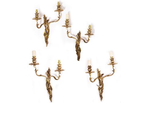 TWO PAIRS OF 18TH CENTURY STYLE LACQUERED BRASS TWO BRANCH WALL LIGHTS with scrolling acanthus leaf decoration, 29cm wide x a