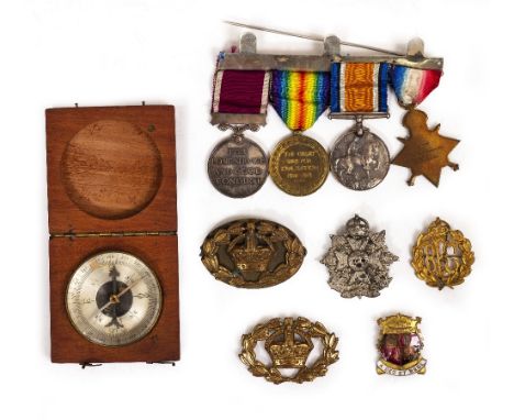 A CASED SET OF FOUR WORLD WAR I MEDALS awarded to 7403 Private J.F. Dingain. RIF. Brig. together with a 1920's photograph alb