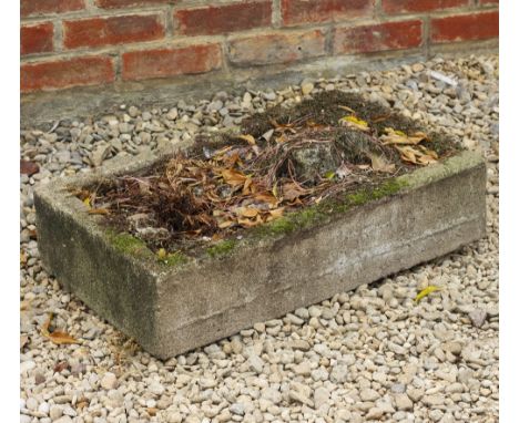 A CAST RECONSTITUTED STONE SHALLOW TROUGH OR PLANTER 66cm wide x 38cm deep x 15cm high together with a reconstituted stone ca