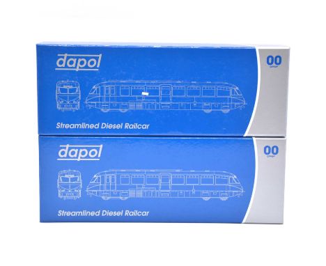 Dapol OO gauge model railway streamlined diesel Railcars, two inlcuding ref 4D-011-003 W14 BR lined Carmine and Cream; ref 4D