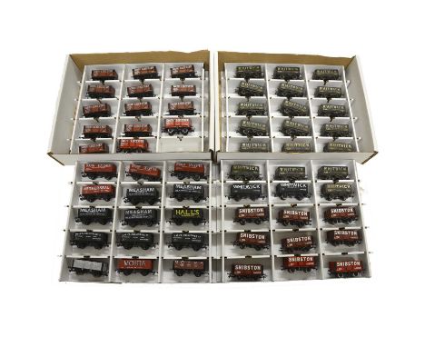 Two trays of OO gauge model railway rolling stock, including Dapol, Bachmann and others, loose.Qty: 2 trays