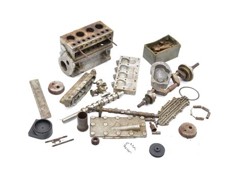 A selection of major parts for a Westbury cylinder four-stroke petrol engine, including crank shaft, cam shaft, piston valves