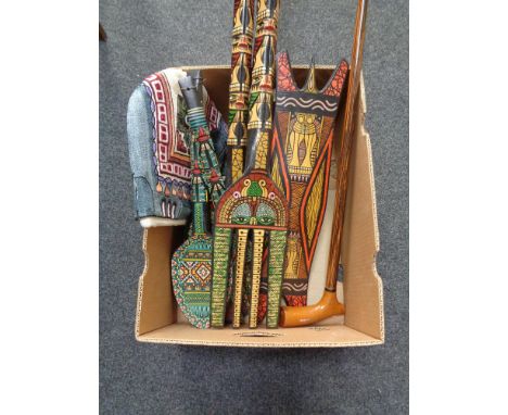 A box of walking stick, twentieth century eastern wooden tourist pieces 