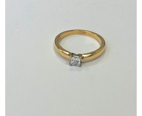 An 18ct gold princess cut diamond solitaire ring, size N. 
