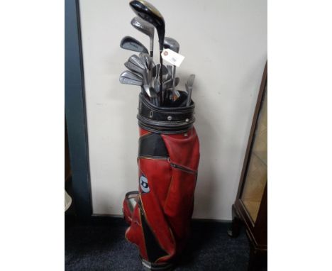 A Dunlop golf bag containing clubs 