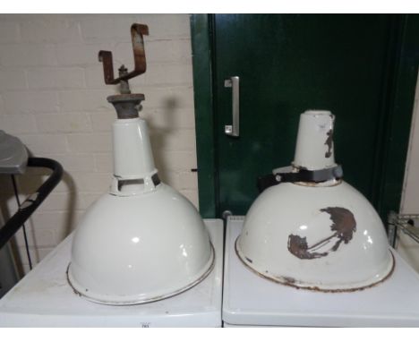 A pair of enamelled industrial light shades 