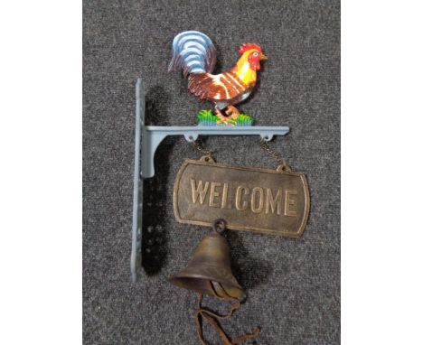 Two metal Welcome signs (one with bracket and bell)