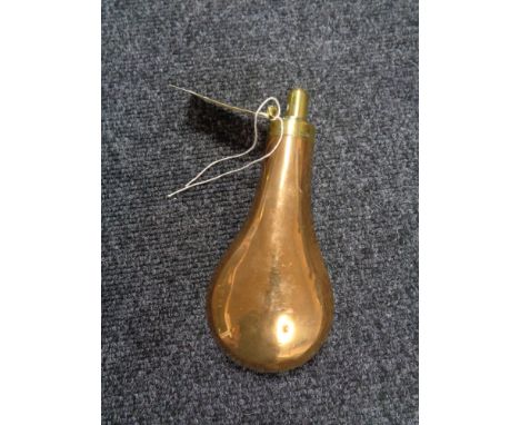 An antique copper and brass black powder flask