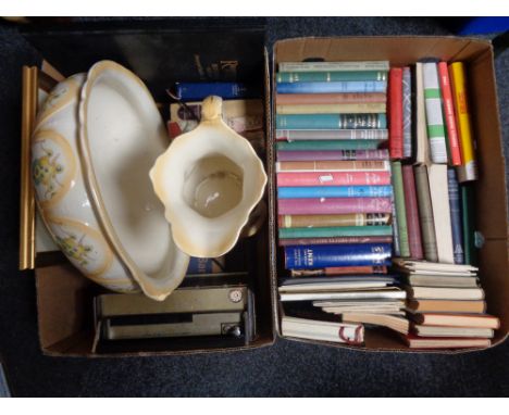 Two boxes of twentieth century hardbacked books, novels, Victorian wash jug and basin, vintage Hitachi radio etc 