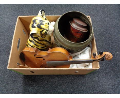 A box of chalk figure of a lion cub, violin, brass embossed planter, vintage tin