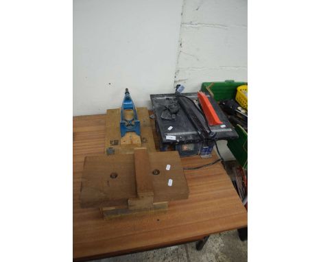 A Nutool tile cutter together with a homemade jig