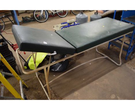 A vintage medical bed