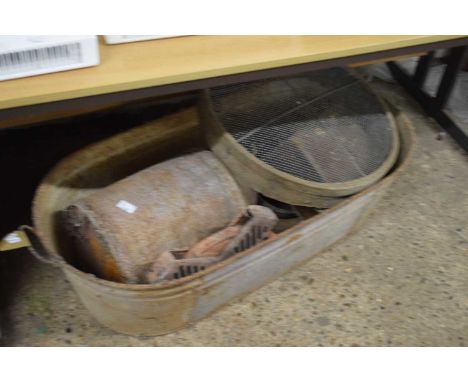 Vintage tin bath together with other vintage bygones