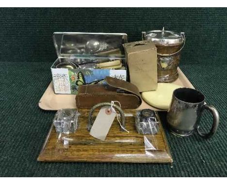 An Edwardian oak desk stand, biscuit barrel, Army torch in leather pouch, hand mirror, cutlery etc 