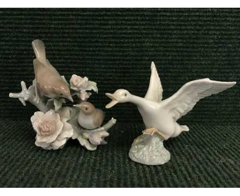 A Lladro figure - girl with duck 
