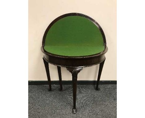 A Georgian style mahogany d-shaped card table