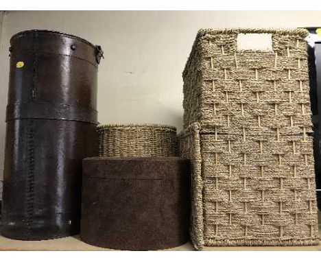 A leather stick pot, a suede lidded box, laundry basket of table linen and a wicker bin 
