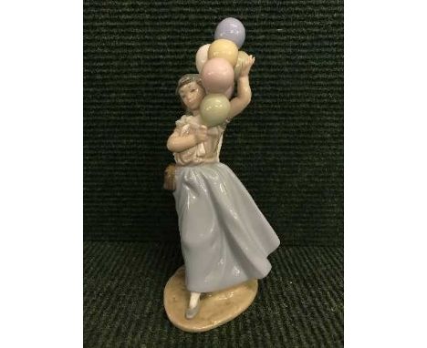 A Lladro figure - girl with balloons 