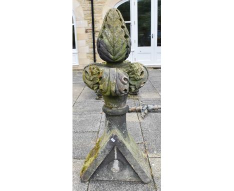 A Weathered Carved Stone Finial, the acanthus top on a triangular base, 150cm high