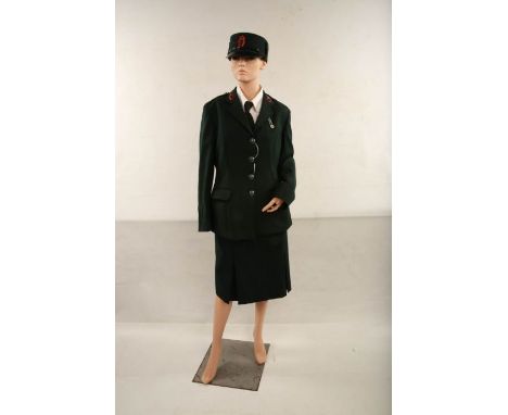 Female RUC 1970s Uniform and PSNI Cap with applied RUC Badge.
From the Bushmills Police Museum
(mannequin not included)


#13
