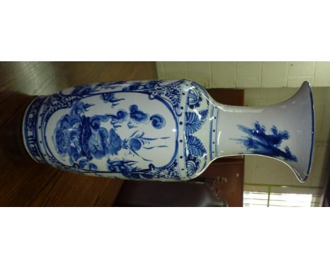 Large oriental style blue and white ceramic vase