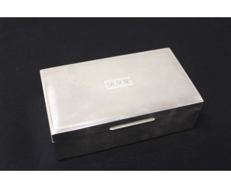 Contemporary silver cedar-lined cigarette box of rectangular form, with domed hinged cover, engine-turned decoration and engr