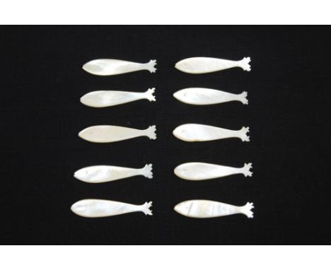 Ten solid carved mother of pearl fish