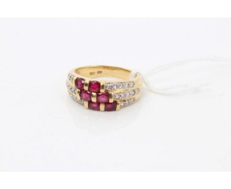 Gold (18ct) ruby and diamond set three band ring.  Ring size M½