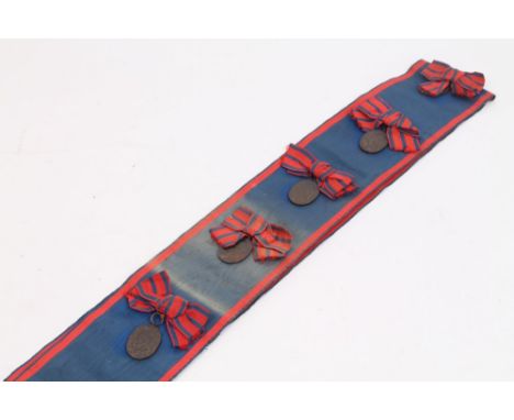 Imperial German sash with five War Merit medals.  N.B.  Awarded from 1916 - 1918.  These medals were awarded to women who ass
