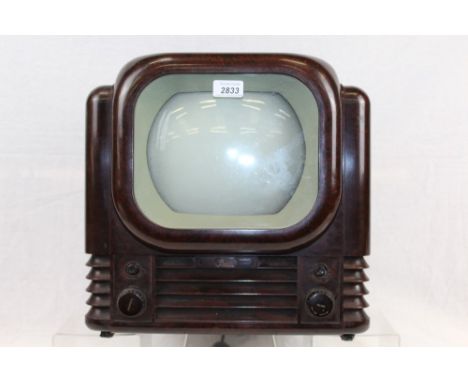 1950s Bush television in bakelite case with original retailer's label - R. L. Mann, Connaught Avenue, Frinton