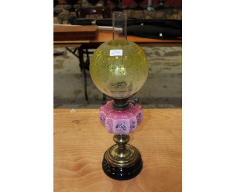 Victorian oil lamp with pink glass reservoir and yellow etched glass shade