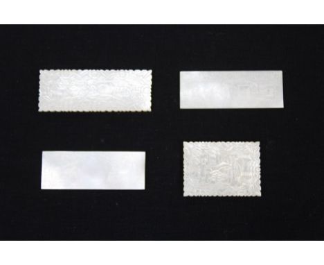 Two rectangular heavily carved figural mother of pearl gaming counters, together with two others
