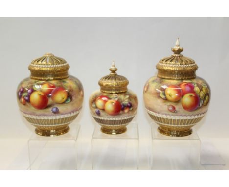 Three Royal Worcester porcelain pot pourri vases with covers, each with hand-painted fruit decoration and signed by H. Ayrton