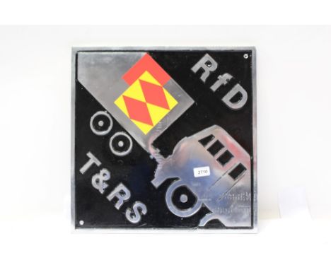 Square cast metal engine name plate, marked - RFD  T.& R.S., with outline engine and truck