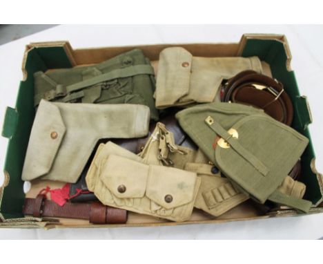 Selection of militaria - to include webbing holsters, ammunition pouches, Webley service revolver holster, Sam Browne belt an
