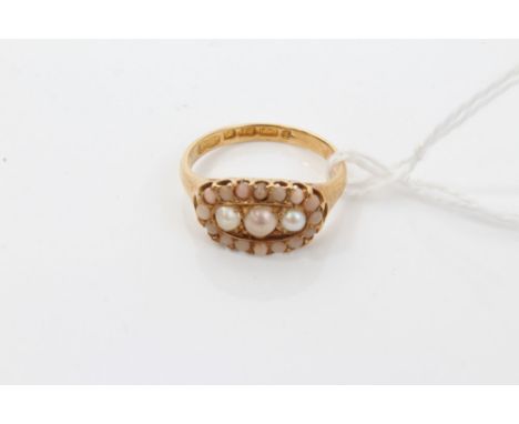 Victorian gold (18ct) three-pearl ring with seed pearl border.  Ring size M½